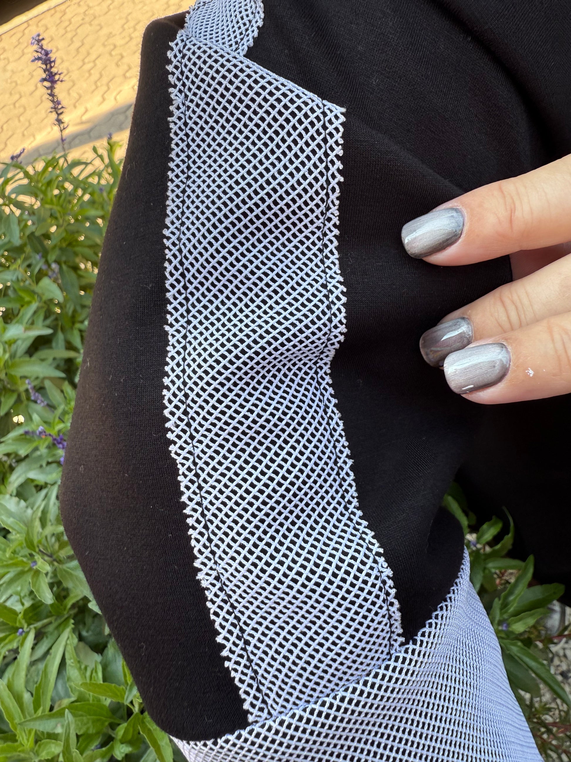 Close-up of sleeve and fabric texture – ultra-soft and durable material.