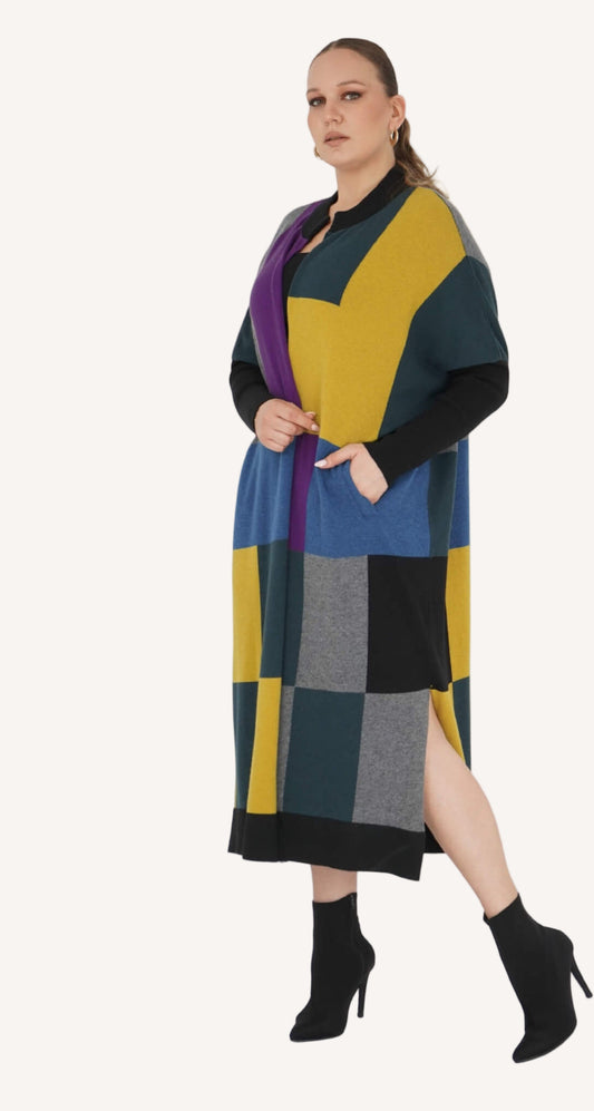 Plus-size model in City Colors Cardigan – emerald and mustard color block lambswool knit By Zola