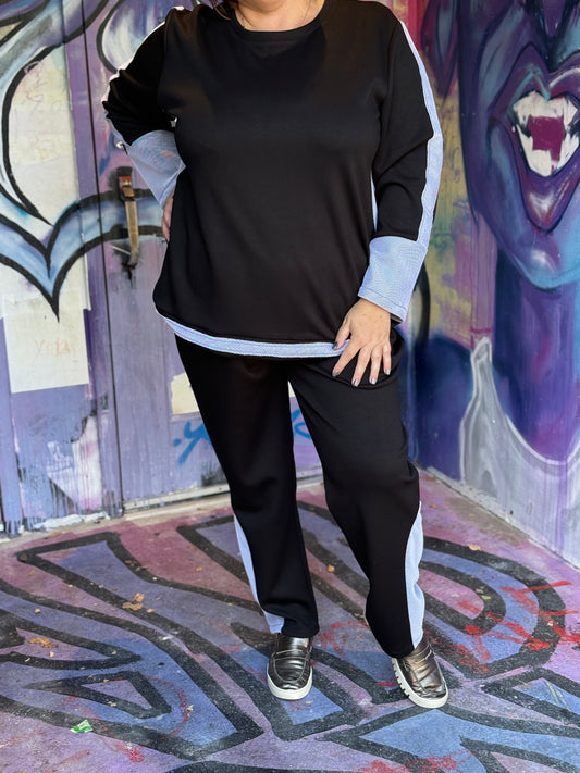 Front view of plus-size model wearing City Chic Cozy Everyday Set in Midnight Black with White Contrast, size 2XL–4XL.