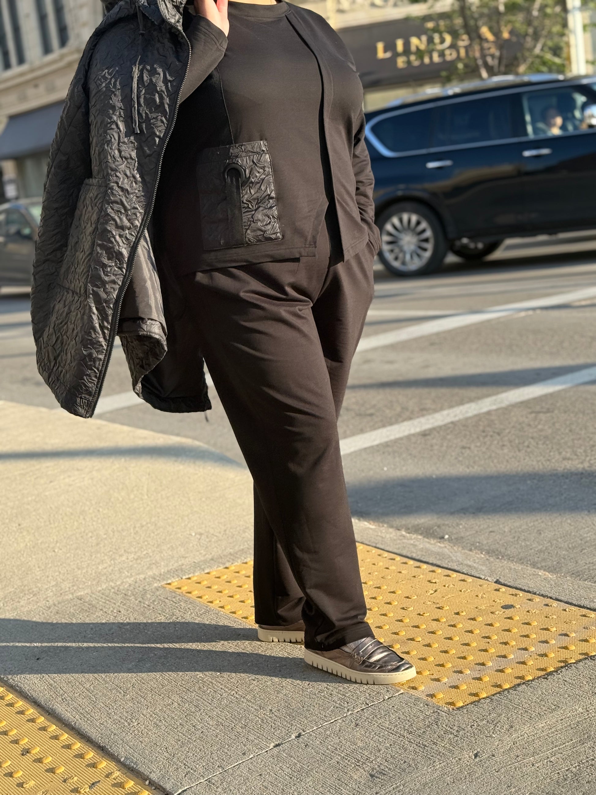 Side view of City Comfort Suit, relaxed plus-size fit, versatile 3-piece design.