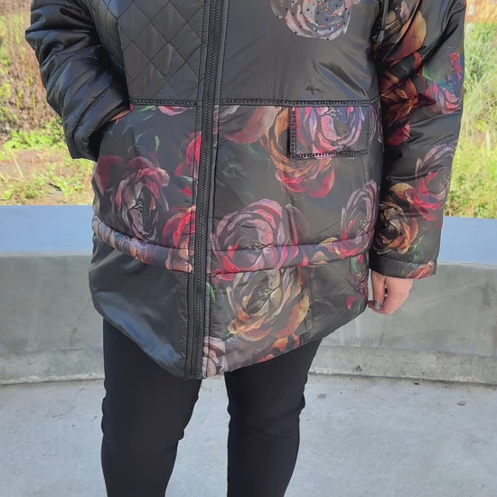 Model wearing the Rose Whisper Winter Jacket in Black Rose, plus size winter jacket shown in motion, available in 2XL–4XL.