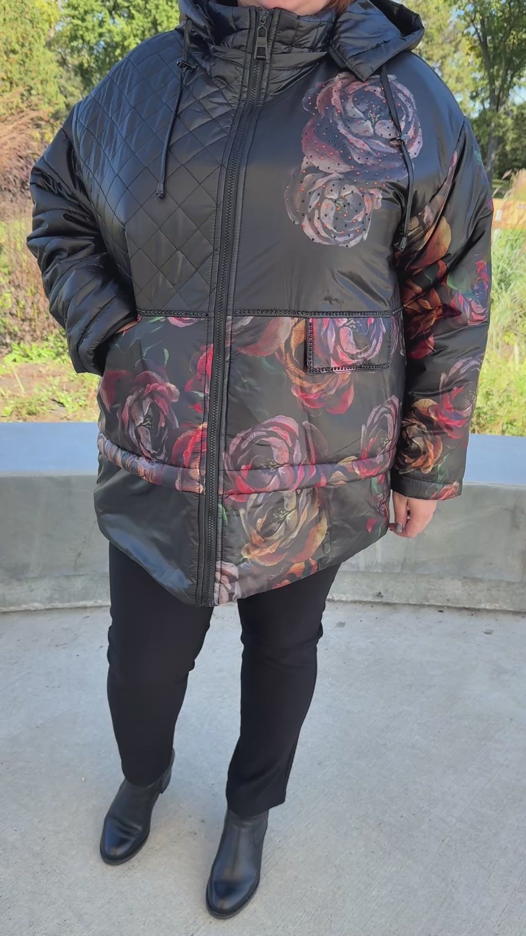 Model wearing the Rose Whisper Winter Jacket in Black Rose, plus size winter jacket shown in motion, available in 2XL–4XL.