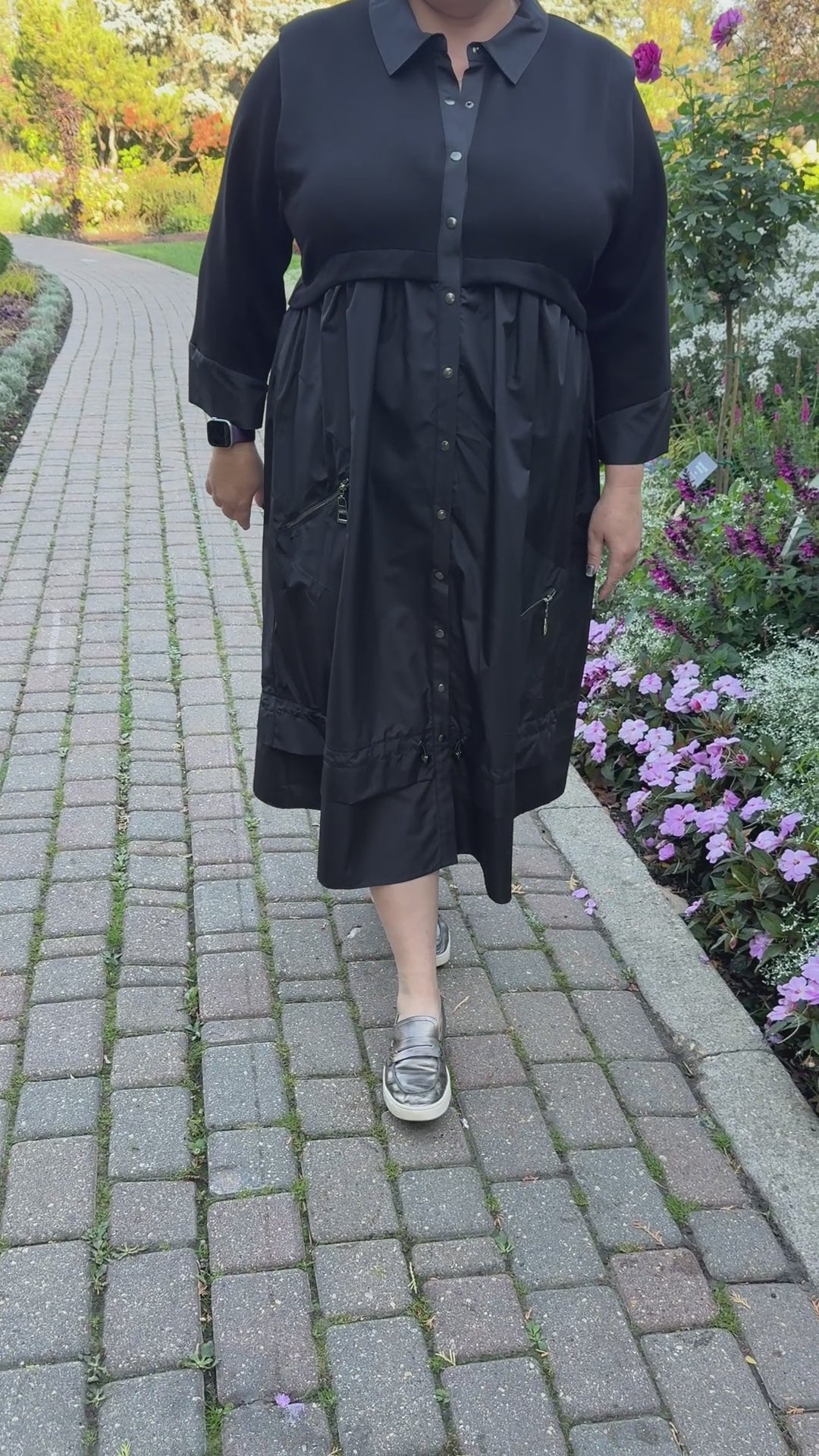 Elegant plus-size black dress styled with heels or sneakers – By Zola Winnipeg