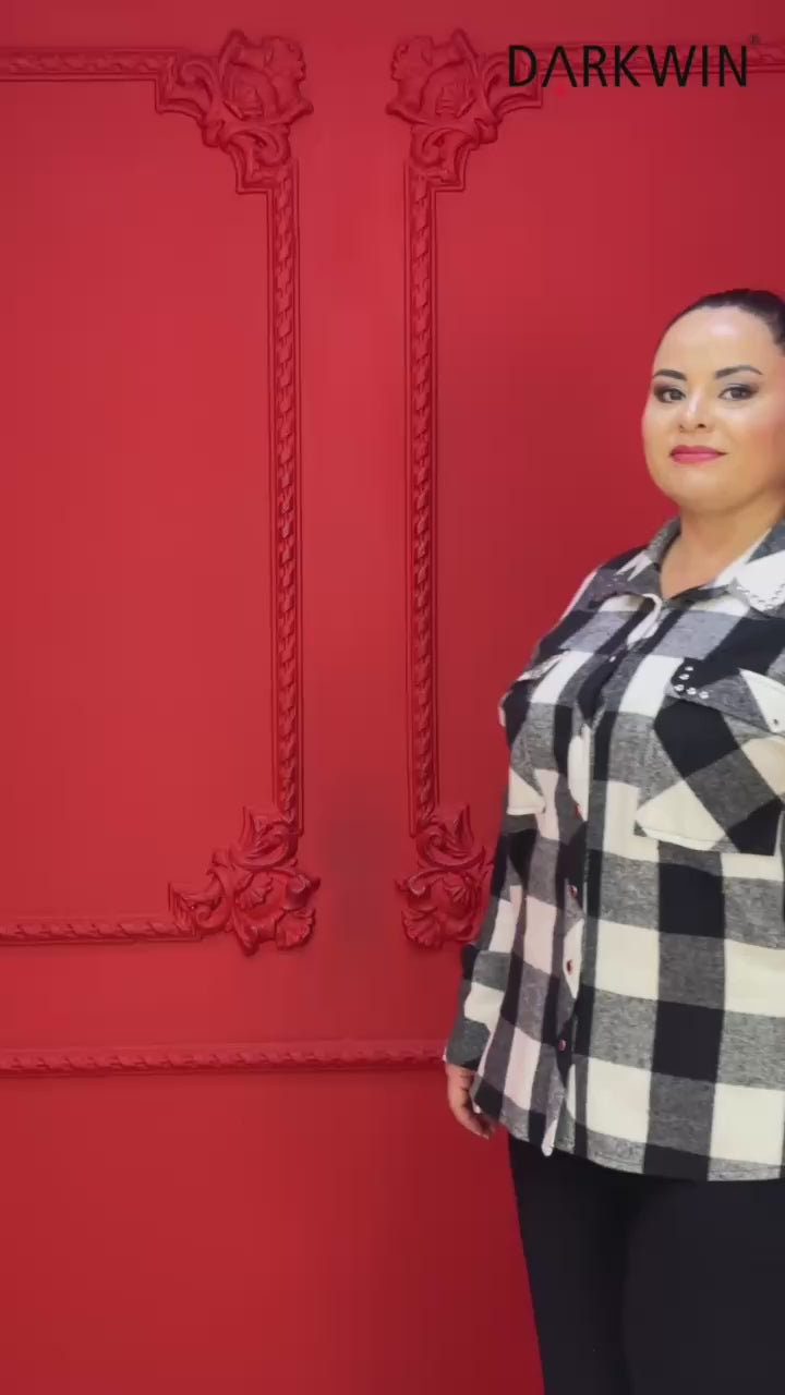 Plus-size model wearing check shirt buttoned